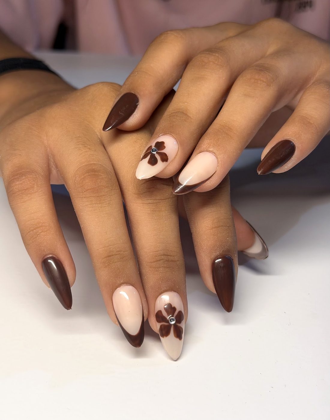 Cocoa and nude almond nails with hand-painted flowers