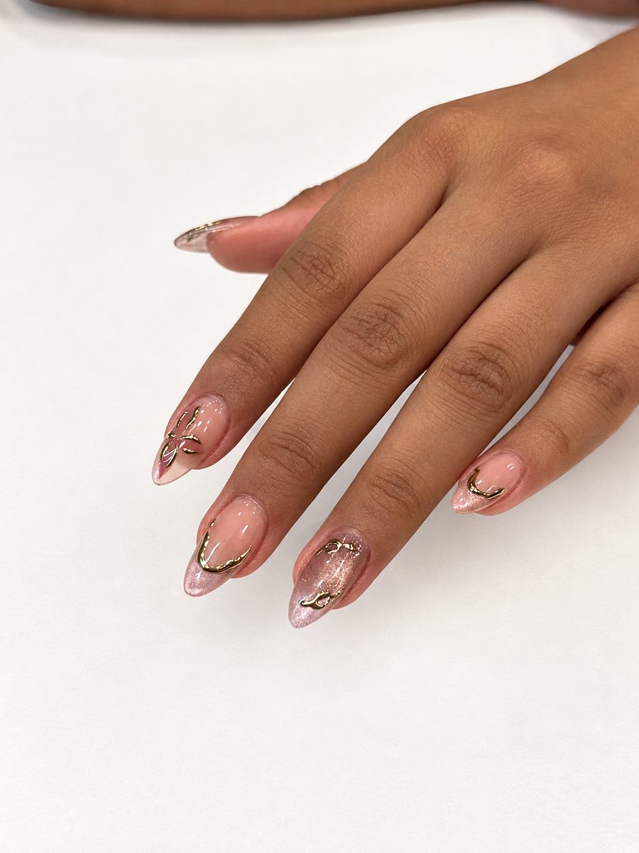 Nude almond nails with fine line art